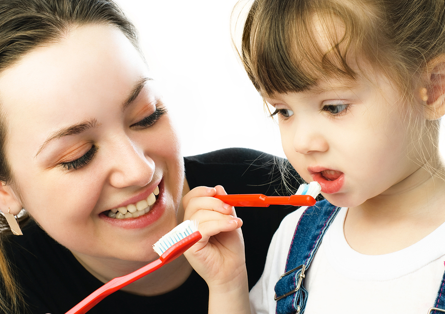 Family Brushing Teeth, Minden Family Dentistry
